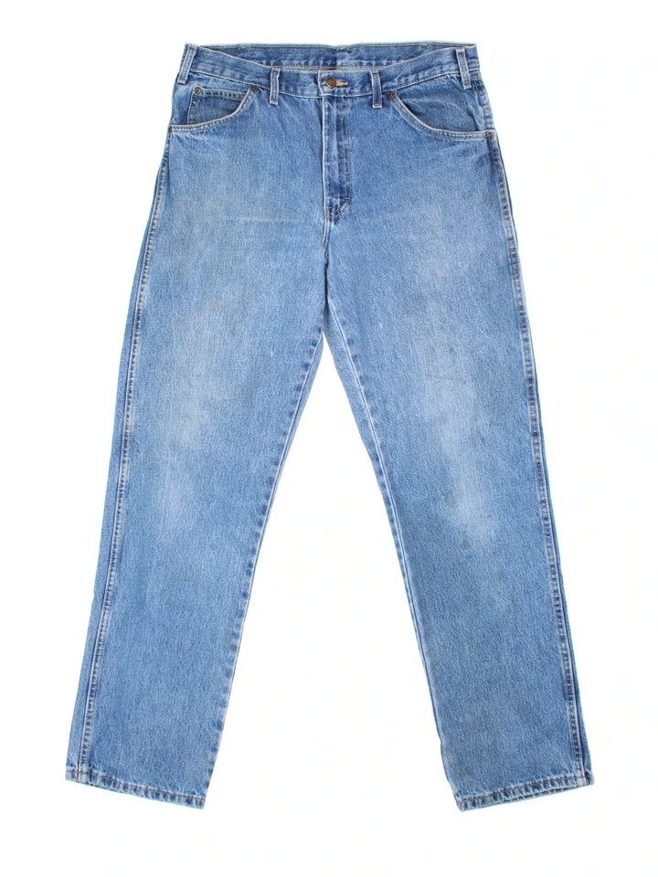 Dickies Jeans in blue colourway with multiple pockets and the logo embroidered on the back.