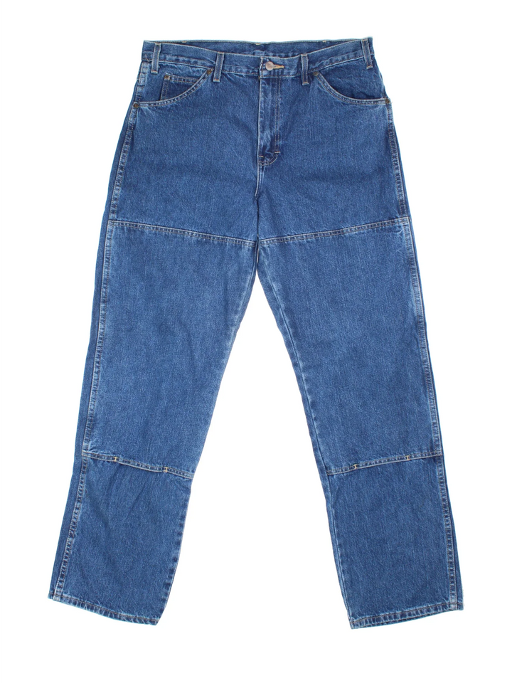 Dickies Jeans in blue colourway with multiple pockets and the logo embroidered on the back.