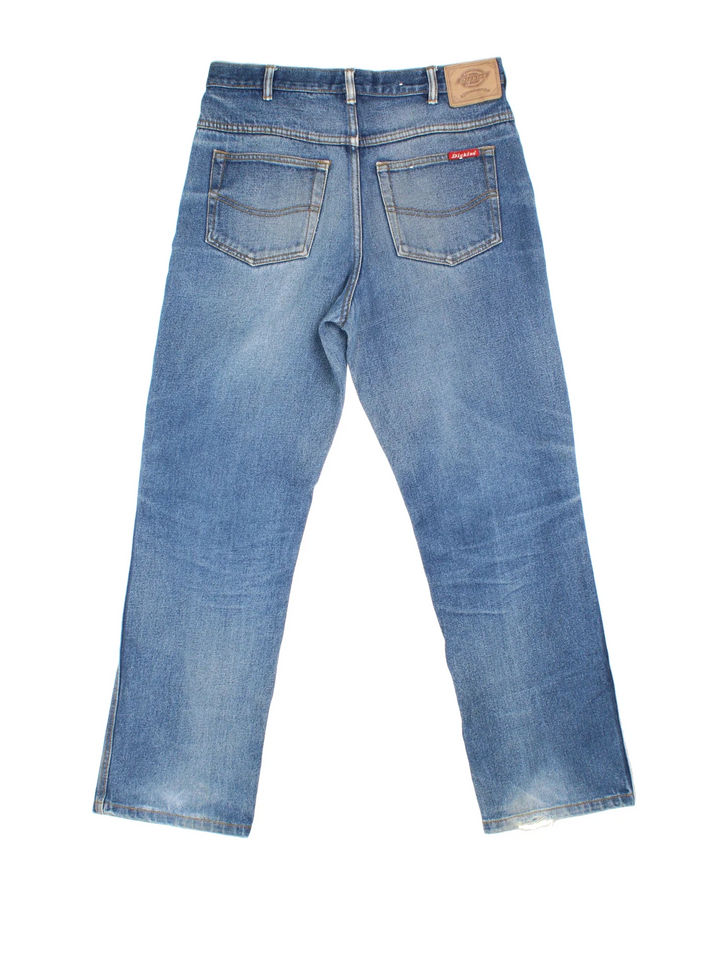Dickies Jeans in blue colourway with multiple pockets and the logo embroidered on the back.