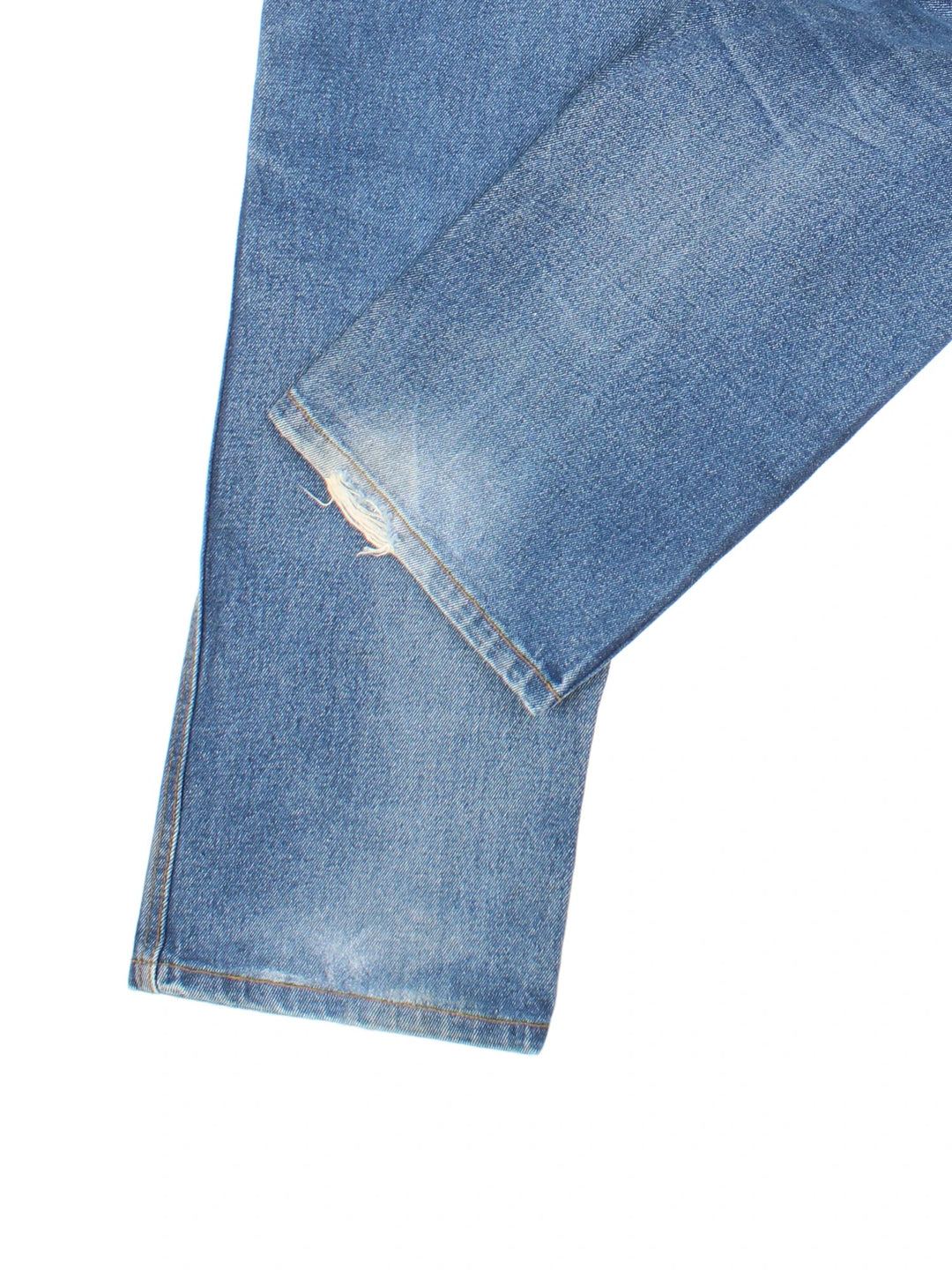 Dickies Jeans in blue colourway with multiple pockets and the logo embroidered on the back.