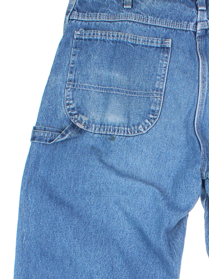 Dickies Jeans in blue colourway with multiple pockets and the logo embroidered on the back.