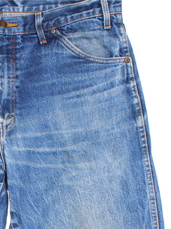 Dickies Jeans in blue colourway with multiple pockets and the logo embroidered on the back.