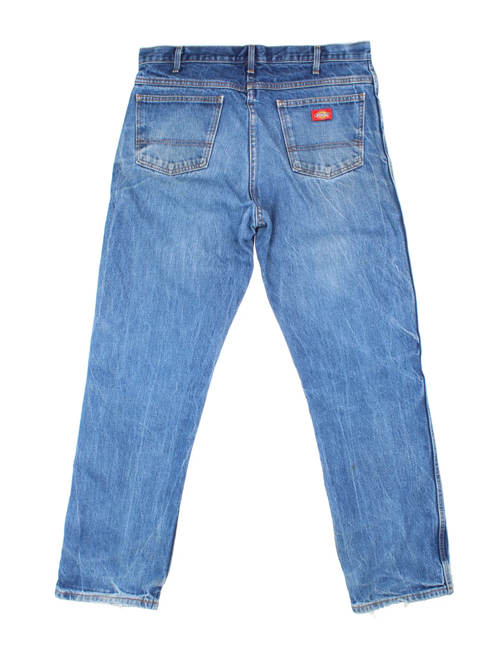 Dickies Jeans in blue colourway with multiple pockets and the logo embroidered on the back.