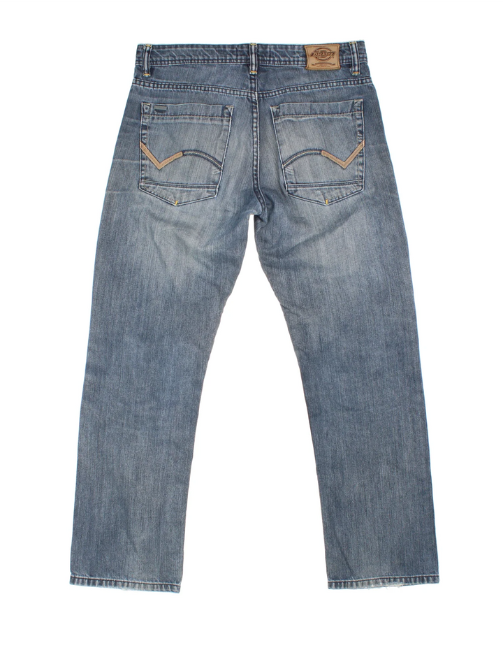 Dickies Jeans in blue colourway with multiple pockets and the logo embroidered on the back.
