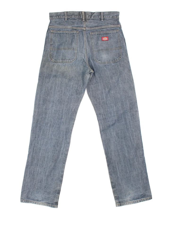 Dickies Jeans in blue colourway with multiple pockets and the logo embroidered on the back.