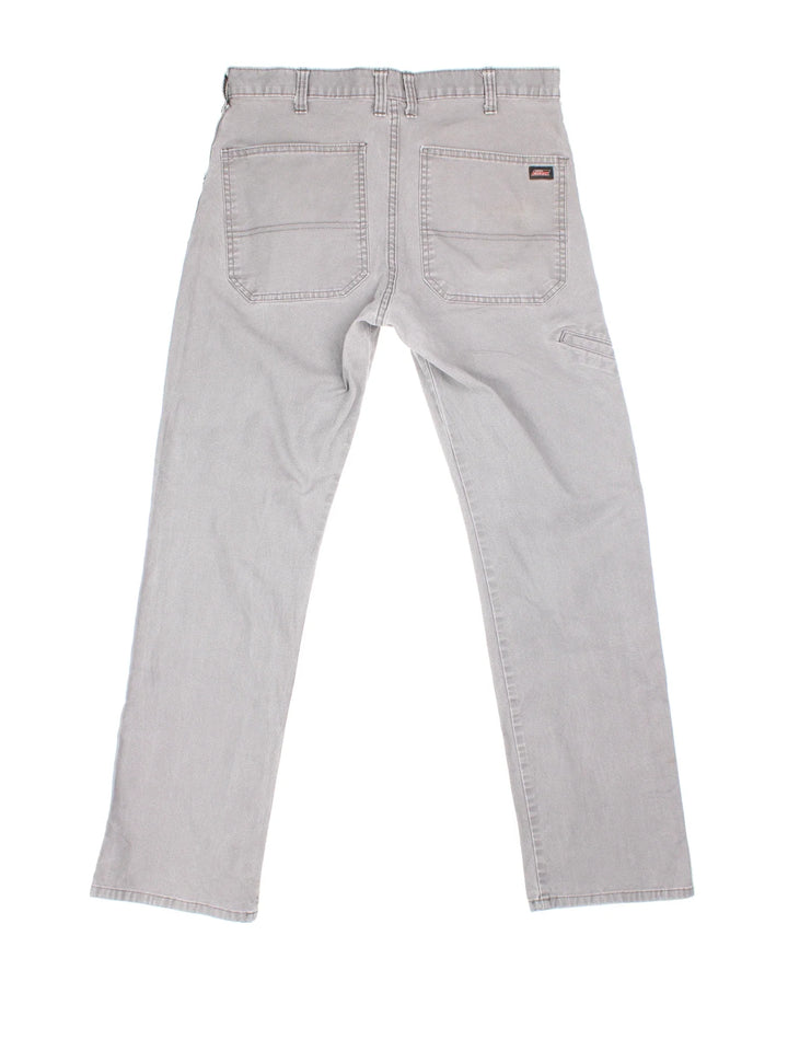 Dickies Carpenter Jeans in grey colourway with multiple pockets and the logo embroidered on the back.