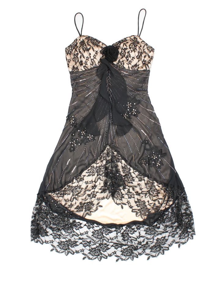 Y2K Beaded Asymmetrical Dress in black colourway. Padded bust detail with scoop back and lace frill overlay.