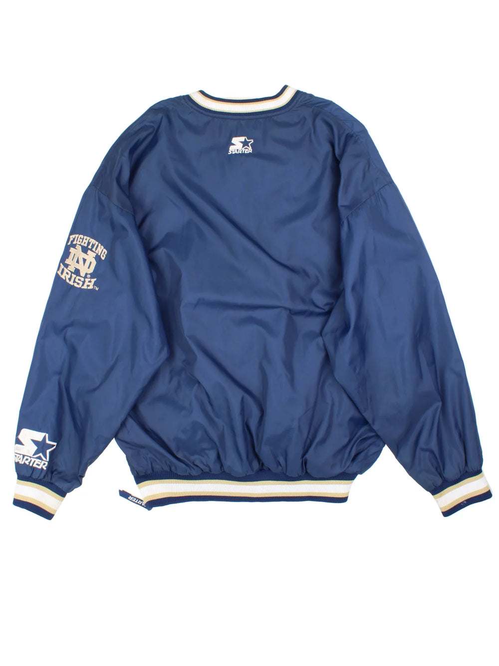 Vintage Starter Notre Damn Drill Training Top in a blue colourway. V neck, side pockets, contast piping and the logo embroidered on the front/back and sleeve.