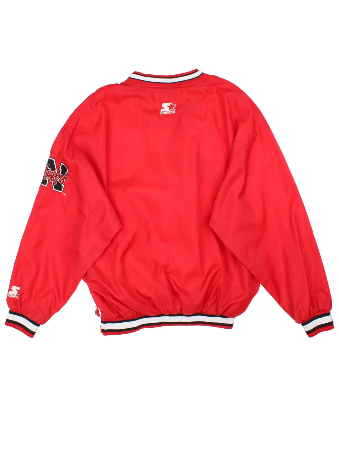 Starter Nebraska Drill Top in the red colourway. Features contrast cuffs/hems, side pockets and logos embroidered on the front/back/sleeve.