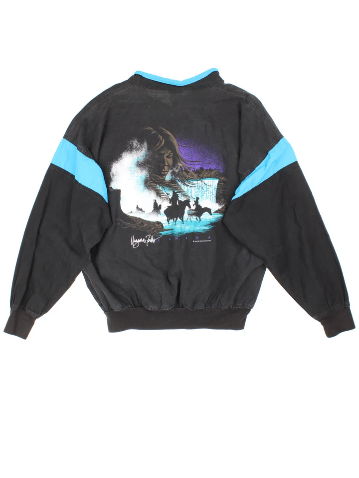 Vintage 1993 Jocky Mountain Windbreaker in a black colourway. Features contrast collar/panelling, and graphic embroidered on the front/printed on the back.