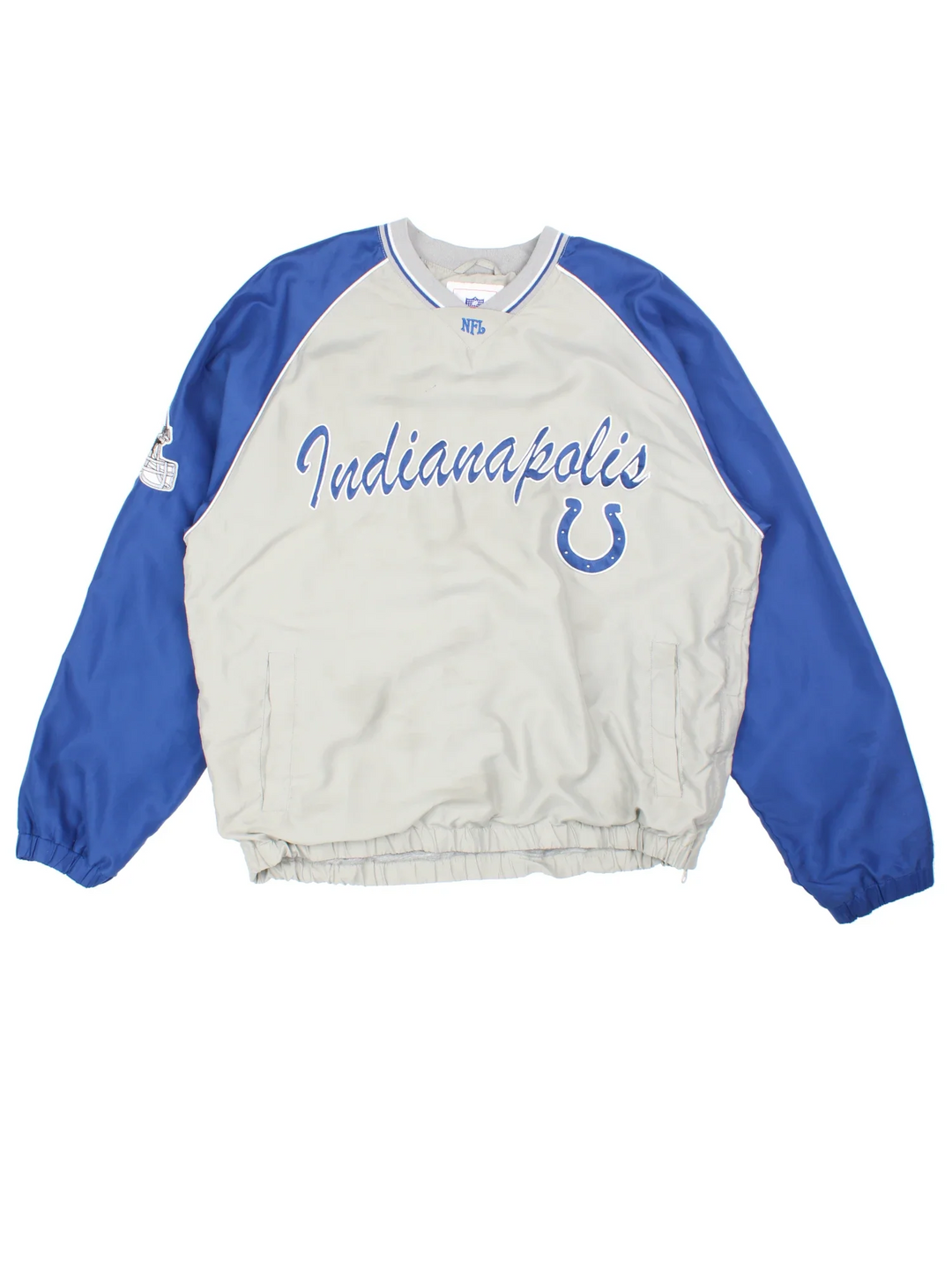 Indianapolis Colts NFL Drill Top in the grey/blue colourway. Features contrast sleeves, side pockets and branding embroidered on the front/sleeve.