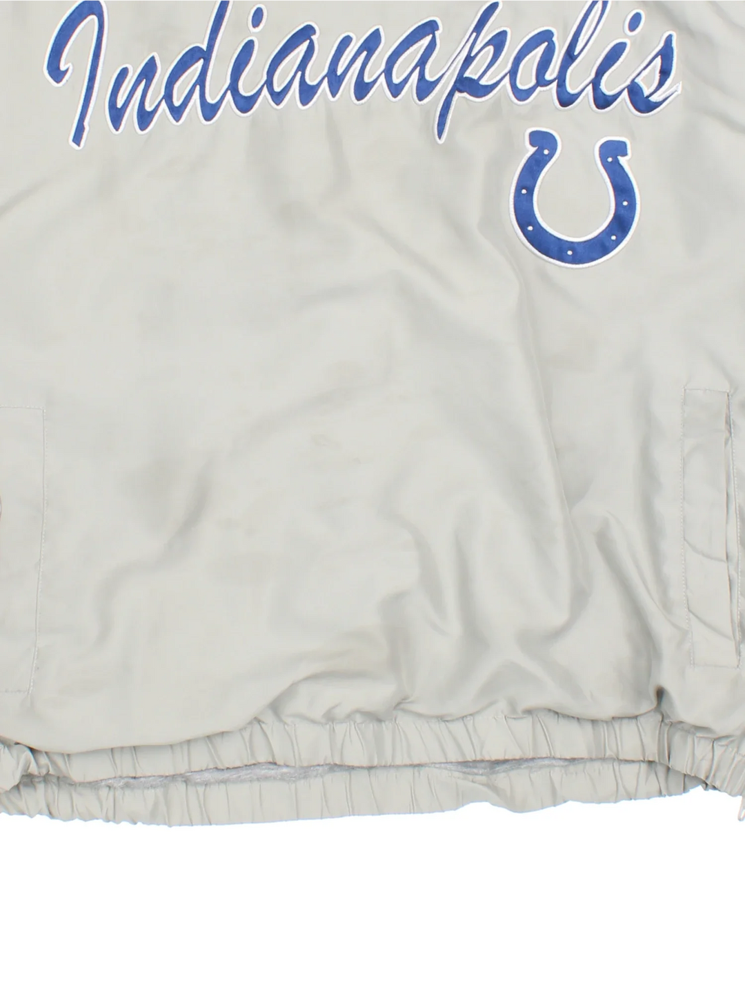Indianapolis Colts NFL Drill Top in the grey/blue colourway. Features contrast sleeves, side pockets and branding embroidered on the front/sleeve.