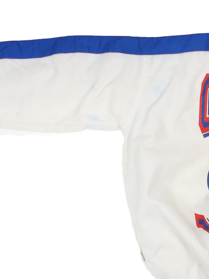 Vintage Montreal Candiens NHL Insulated Sweater in the white/red colourway. Features contrast sleeves, side pockets and branding printed on the front.