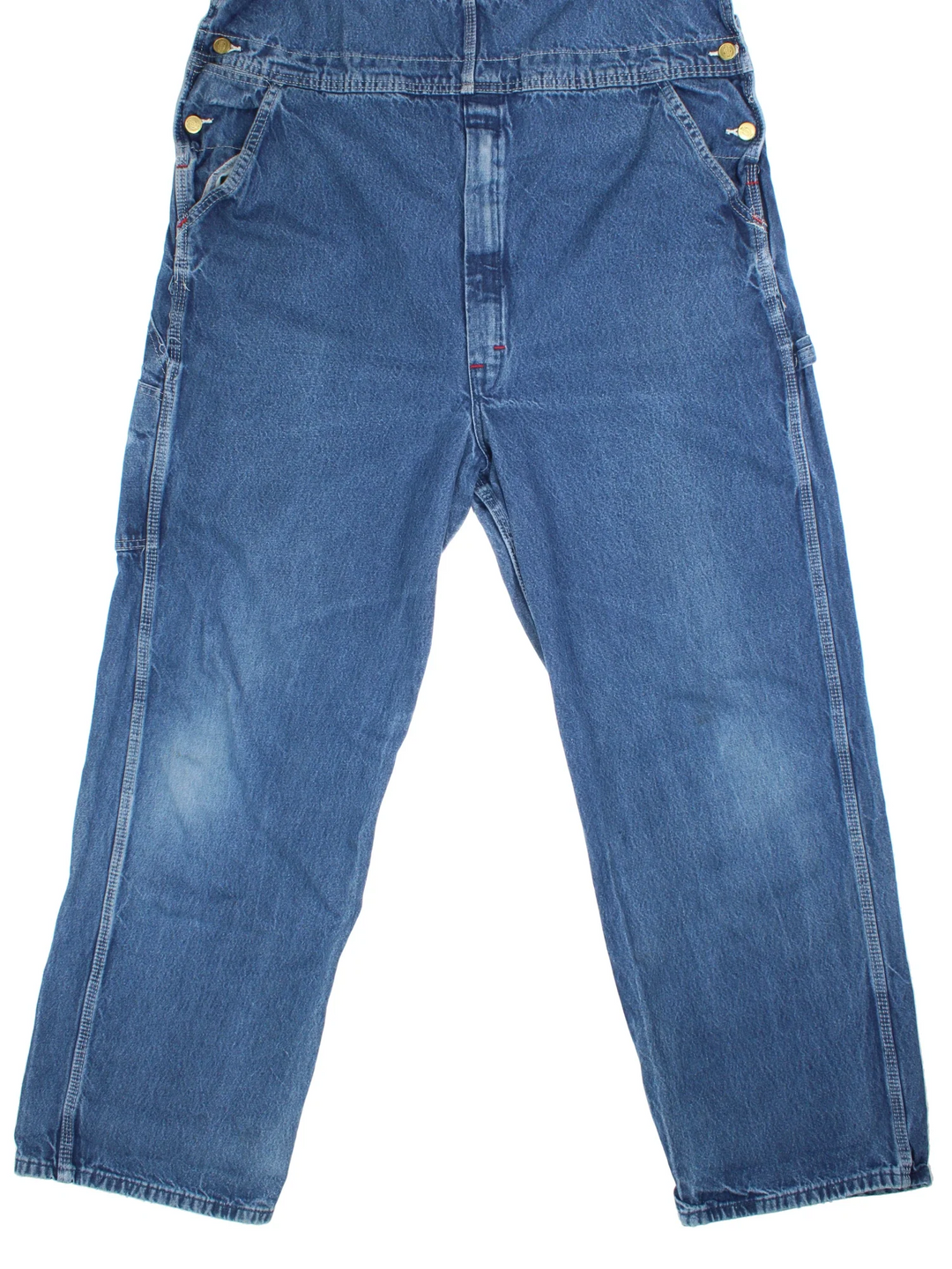 Dickies Denim Dungarees in a blue colourway with multiple pockets and the logo embroidered on the front.