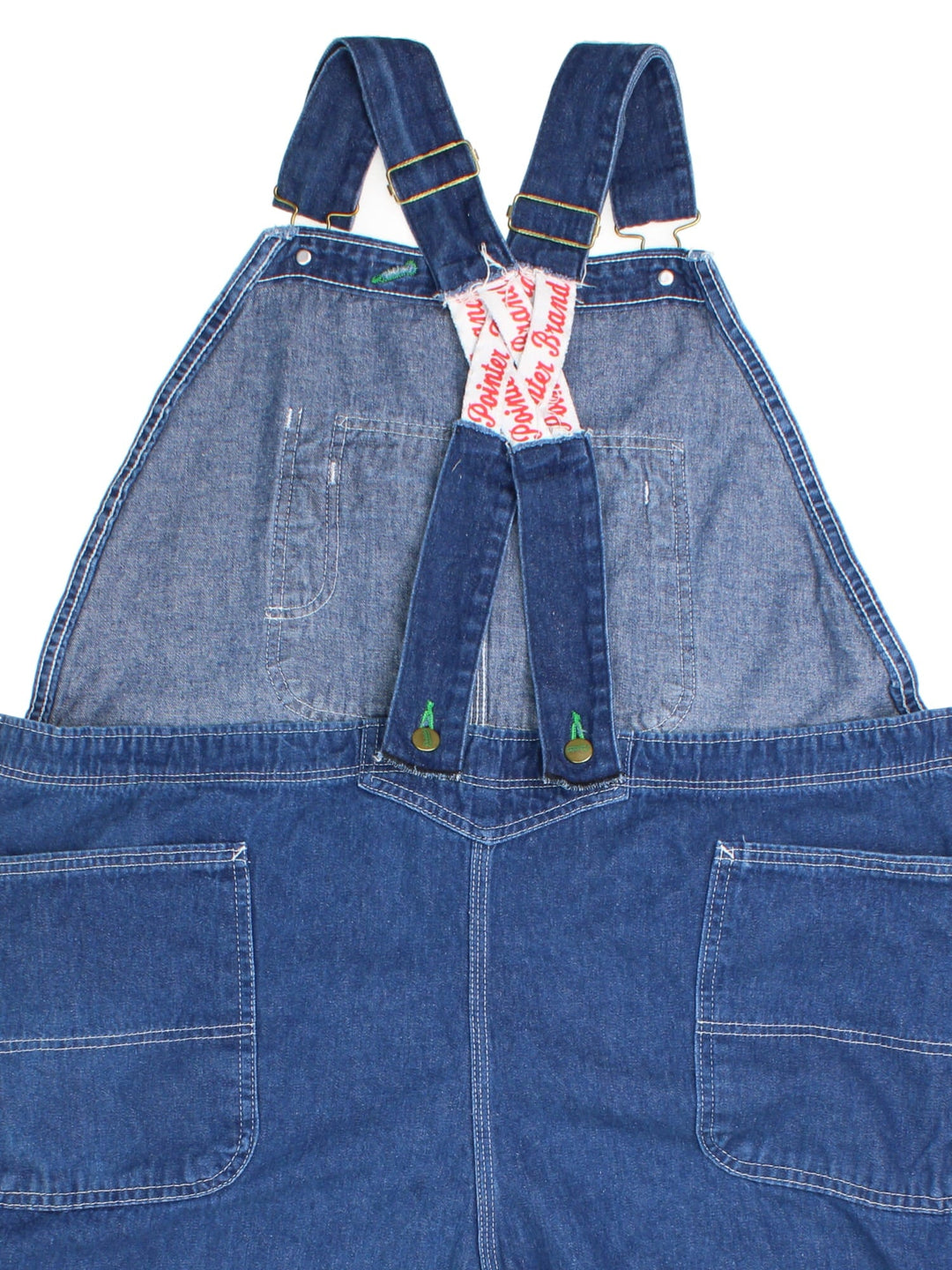 Vintage Pointer Dungarees in blue colourway with multiple pockets, adjustable straps, and the logo embroidered on the front.