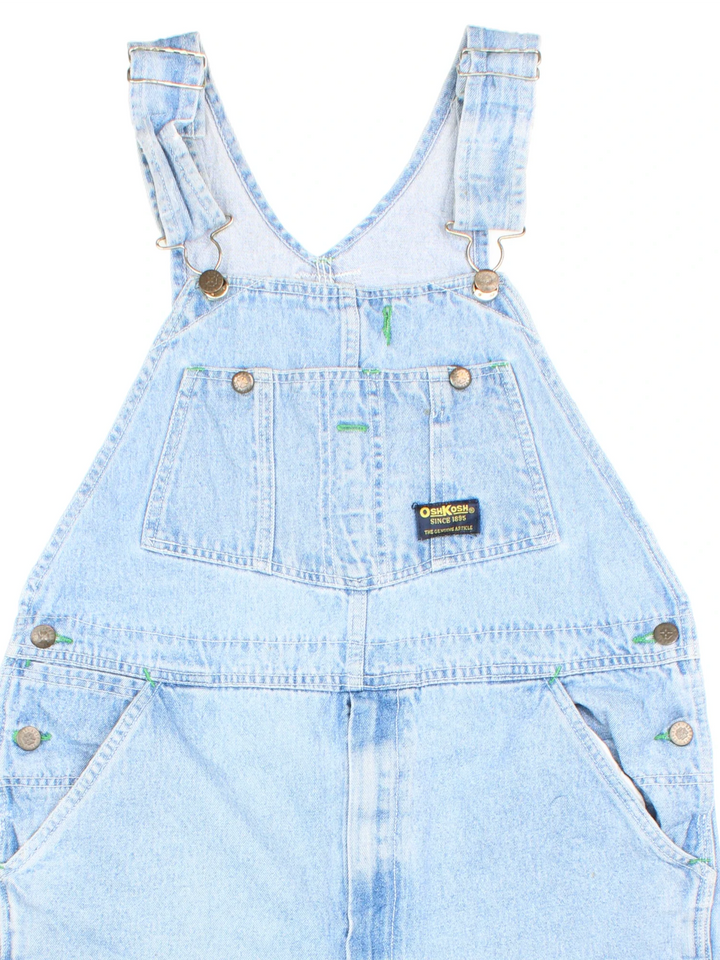 Osh Kosh Dungarees in blue colourway with multiple pockets, adjustable straps and the logo embroidered on the front.