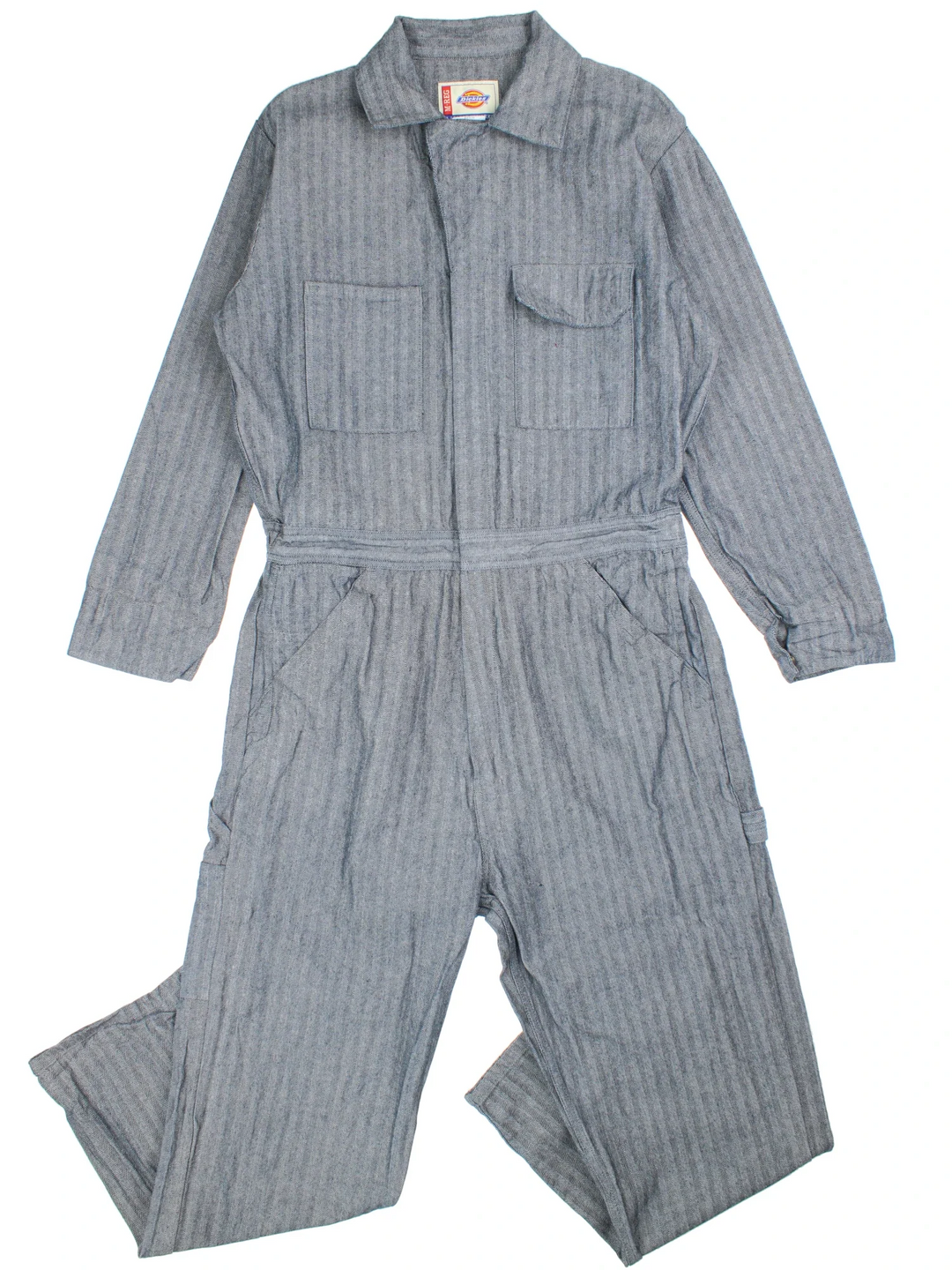 Dickies Boiler Suit in blue colourway. Collared with multiple pockets, zip fastening and branding on the back.