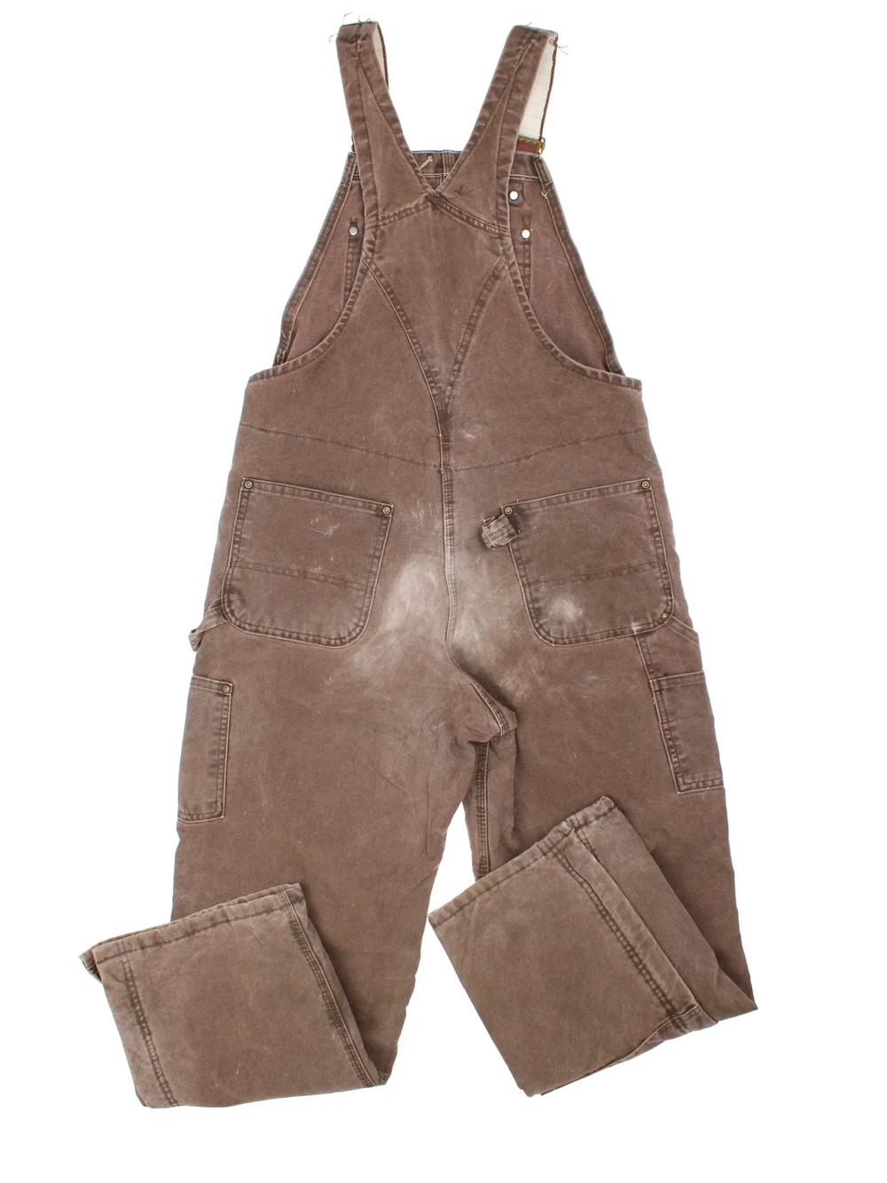 Carhartt Dungarees in brown colourway with multiple pockets, adjustable straps and the logo embroidered on the front.