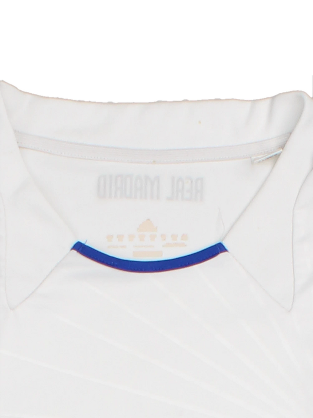 Real Madrid 2010/11  Football Shirt in the  home kit colourway, features embroidered logos and badge on the front.