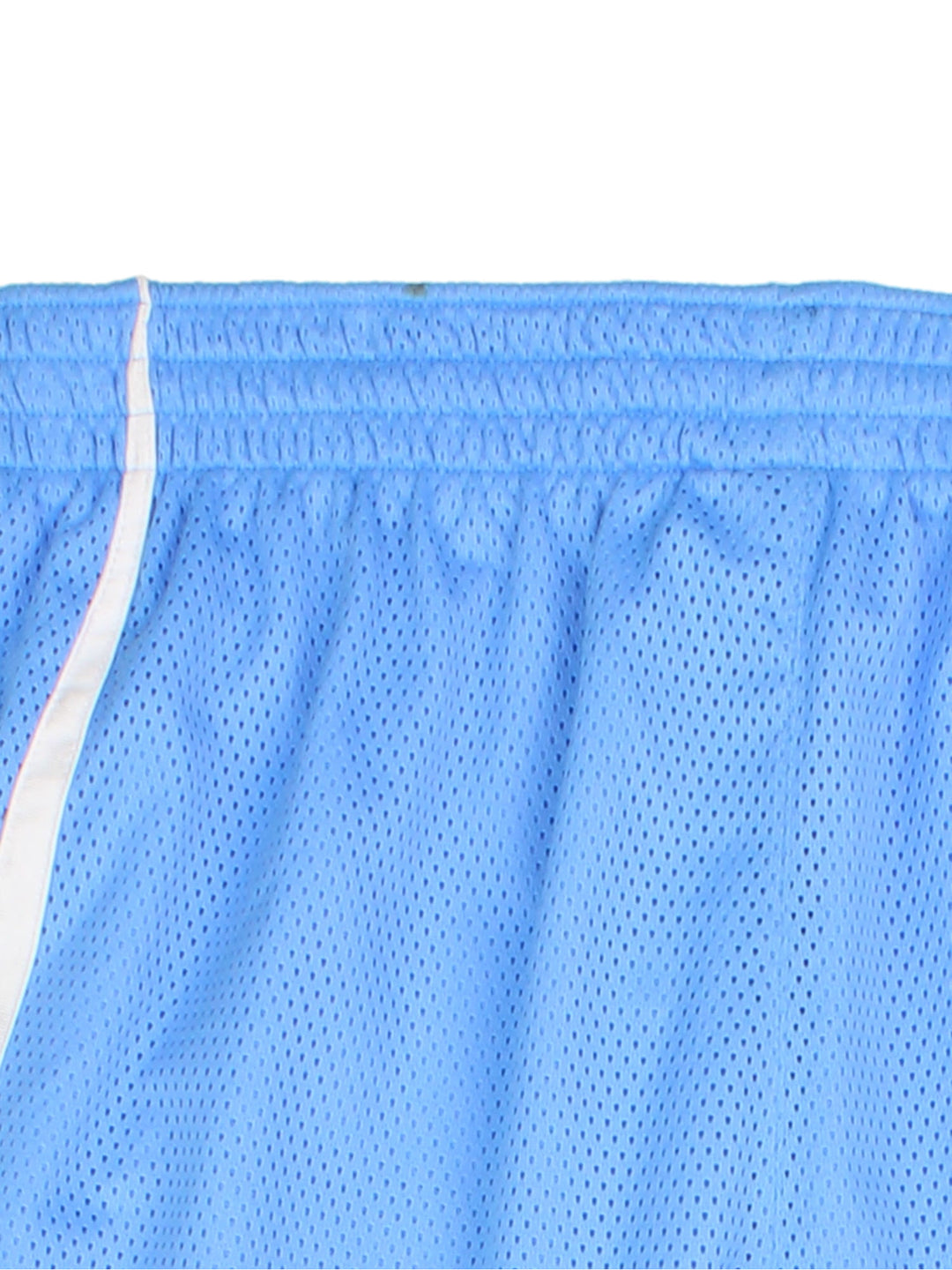 Nike Dri-Fit Basketball Shorts in a blue and white colourway, has and adjustable waist, side pockets and the swoosh logo embroidered on the front. 