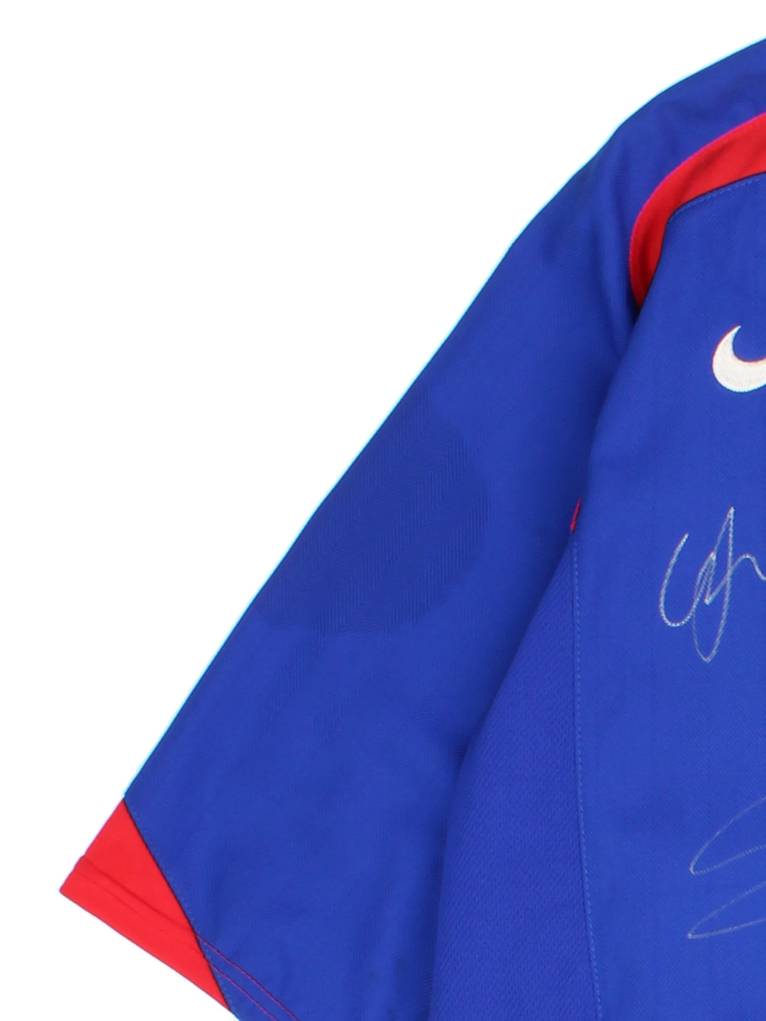 Manchester United 2005/06, Nike Football Kit in a blue, white and red colourway, signed by the players, V-neck and has logos printed on the front.