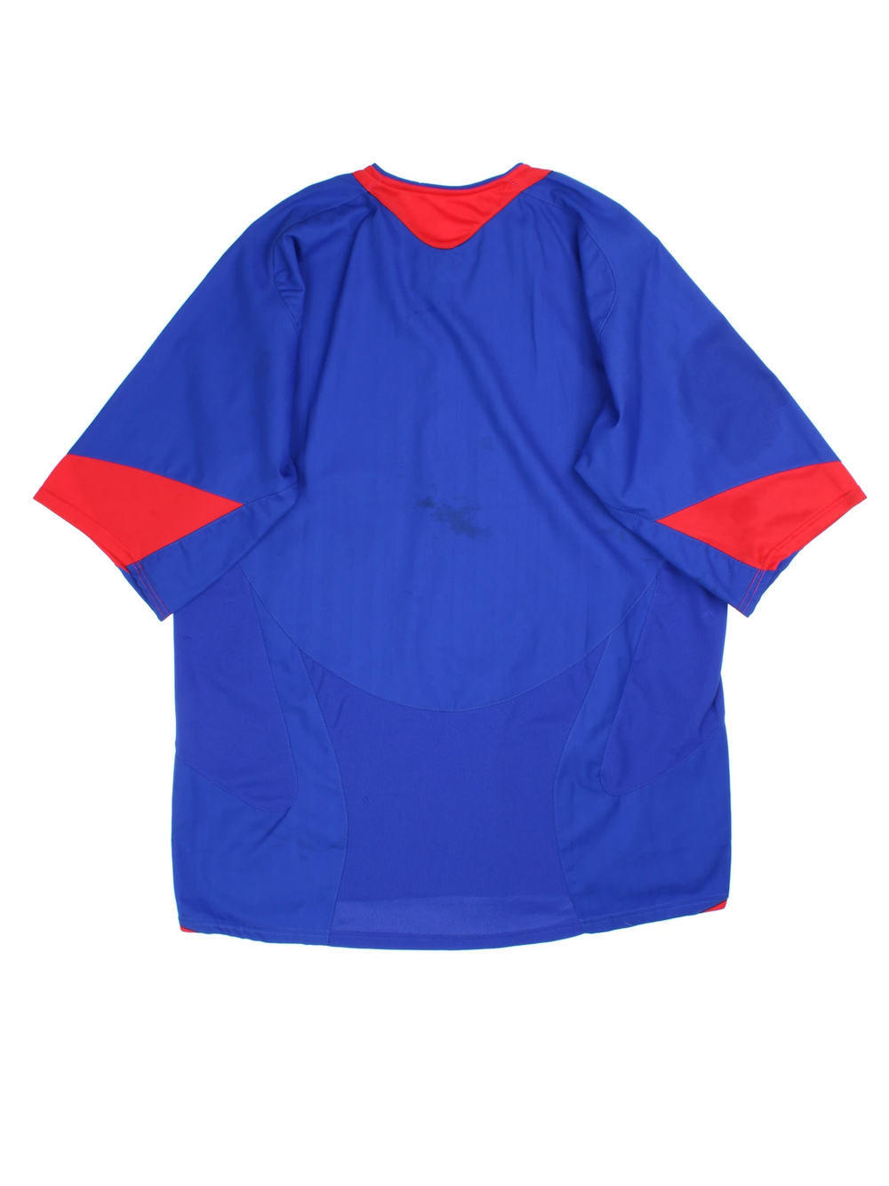Manchester United 2005/06, Nike Football Kit in a blue, white and red colourway, signed by the players, V-neck and has logos printed on the front.