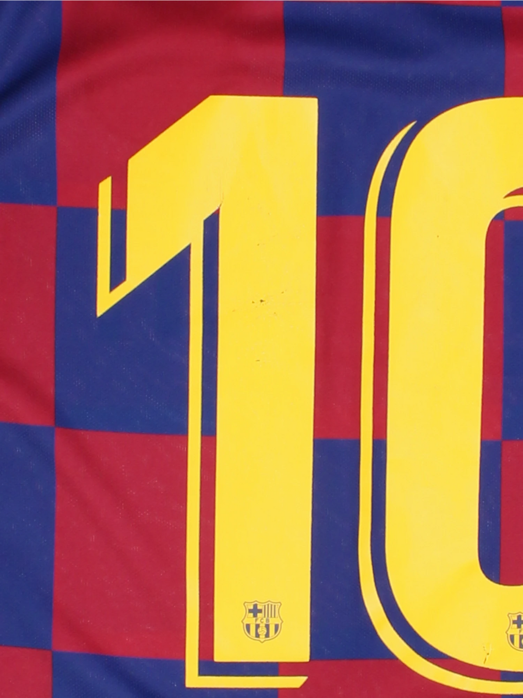 Barcelona Nike Football Shirt in the blue and red home kit colourway, features embroidered logos and badge on the front, and Messi number 10 printed on the back.