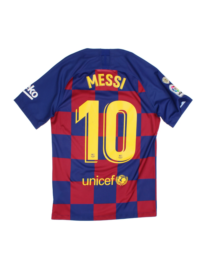 Barcelona Nike Football Shirt in the blue and red home kit colourway, features embroidered logos and badge on the front, and Messi number 10 printed on the back.