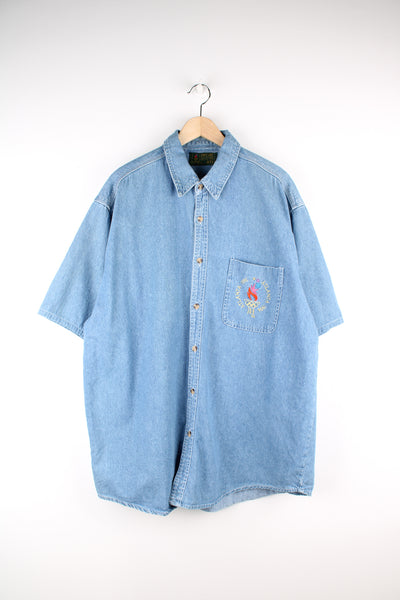 Vintage 1996 Atlanta Olympics denim button up shirt with embroidered graphic on the front pocket 