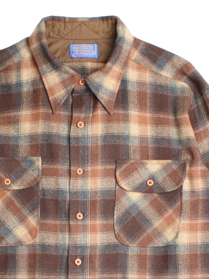 Pendleton Shirt in a brown checked colourway, button up with front patch pockets.