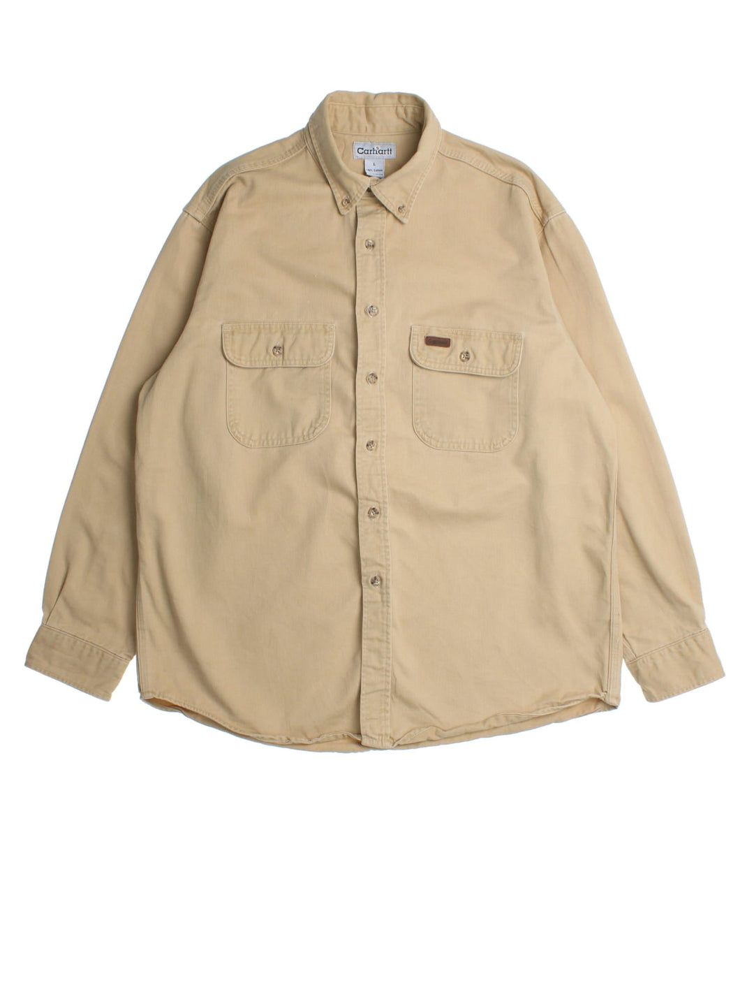 Carhartt Shirt in a tan colourway, button up with front patch pockets and leather patch branding.