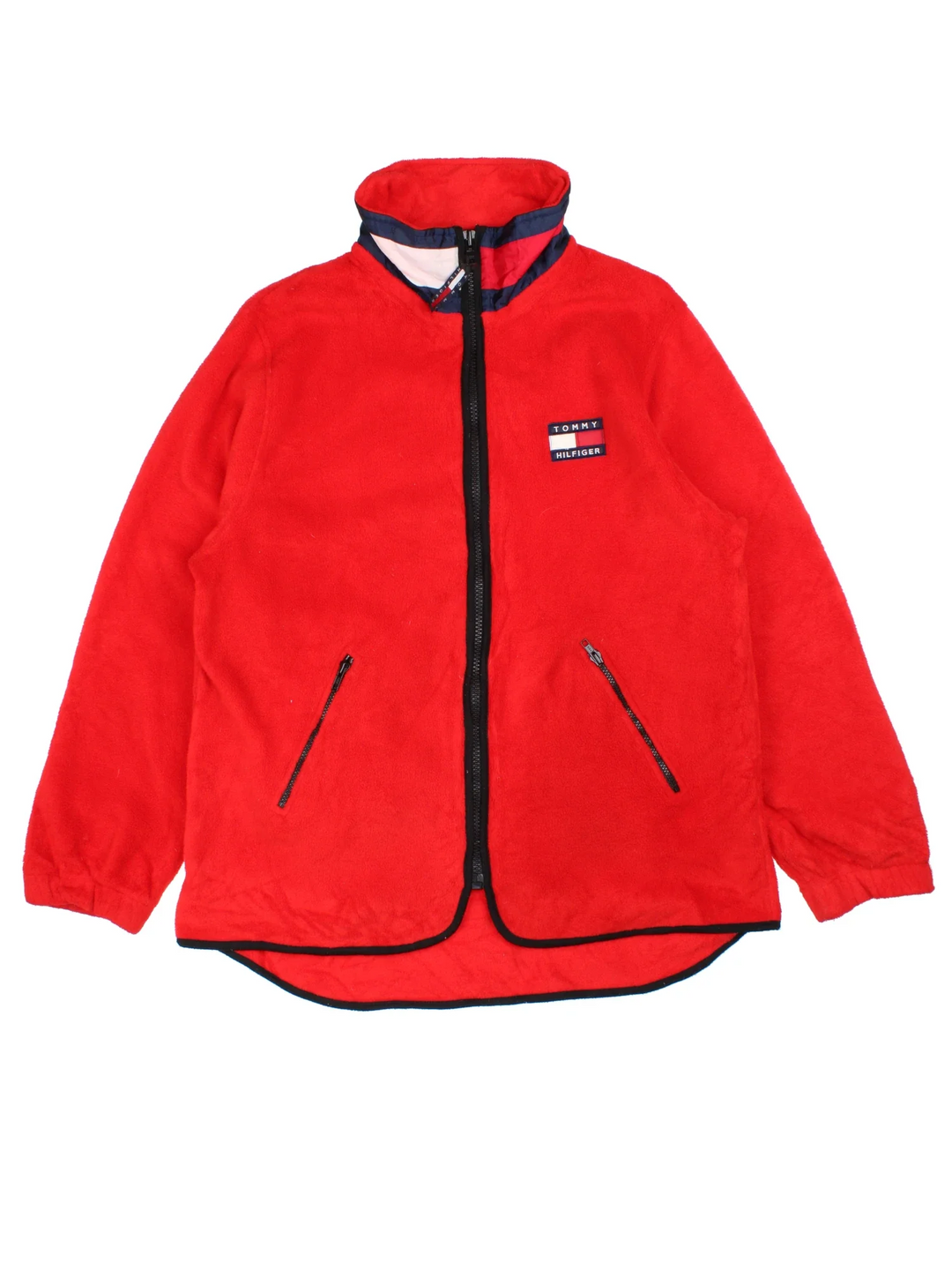 Tommy Hilfiger Fleece in a red colourway. Zips up and has side pockets, and the logo embroidered on the front, back and around the collar.