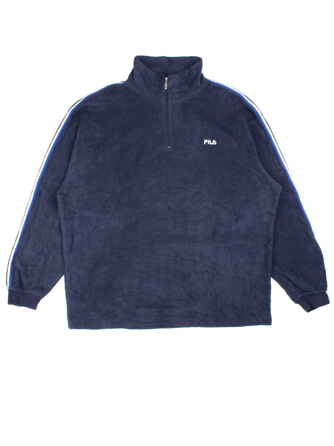 Vintage Fila Fleece in a blue colourway. 1/4 zip up closure and has the logo embroidered on the front.