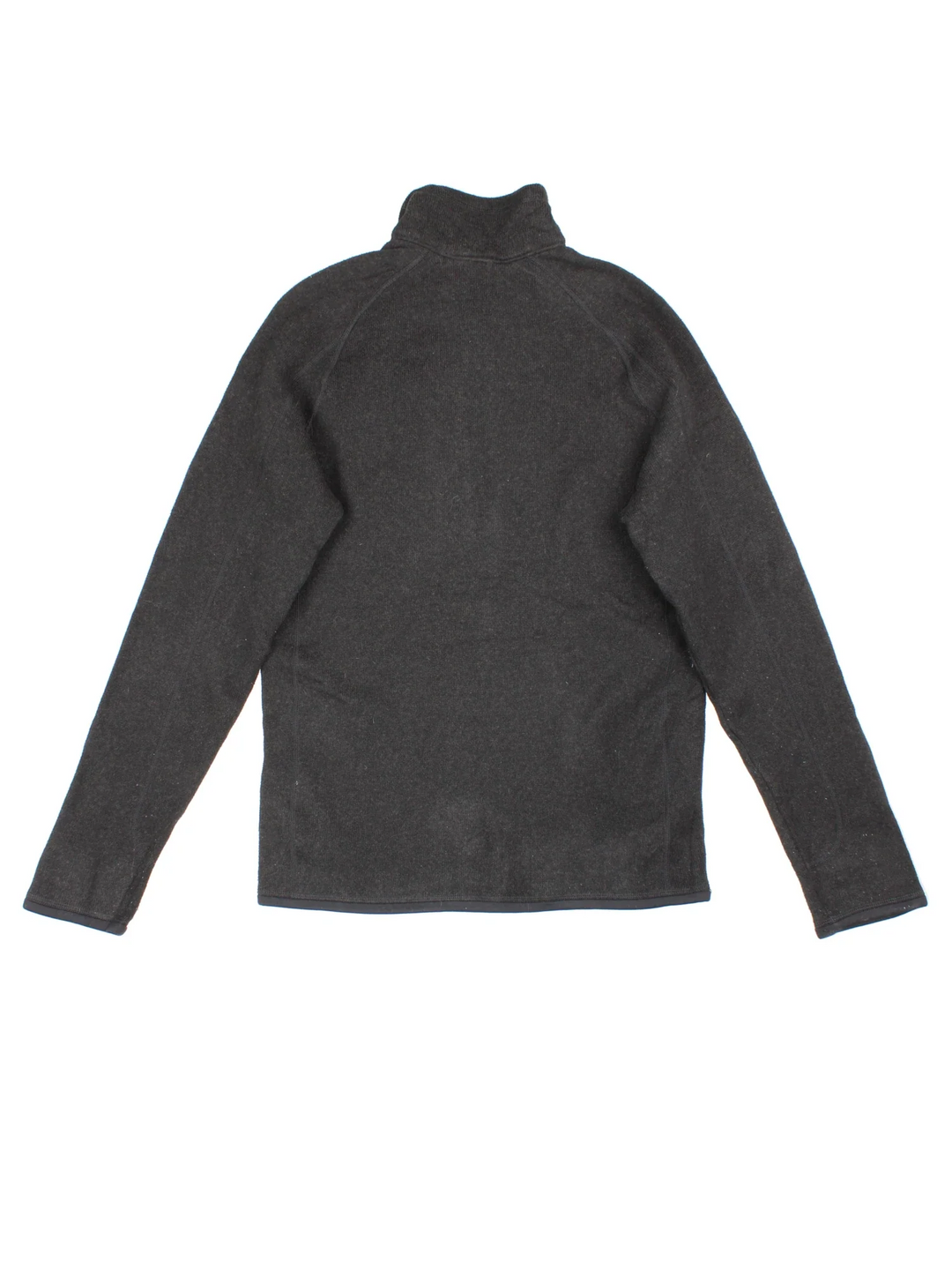 Patagonia Fleece in a black colourway. 1/4 zip up closure and has a chest pocket, and the logo embroidered on the front.