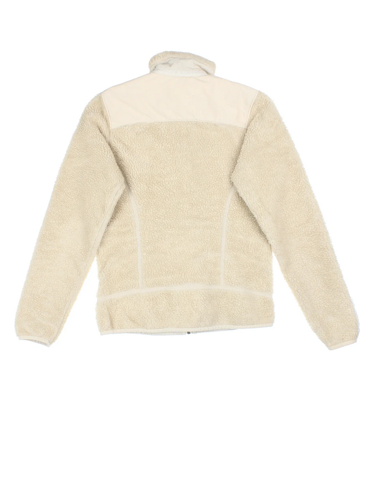 Patagonia Retro-X Fleece in a tan colourway. Zips up and has side pockets, and the logo embroidered on the front.