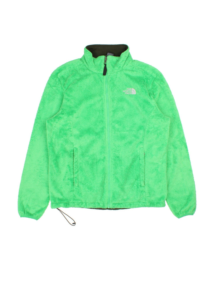 The North Face Osito Fleece in a lime green colourway. Full zip with side pockets, drawstring hem and small classic logo on the front.