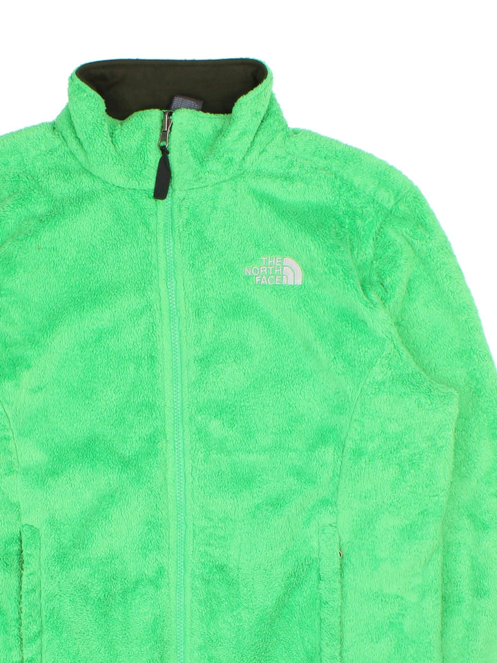 The North Face Osito Fleece in a lime green colourway. Full zip with side pockets, drawstring hem and small classic logo on the front.