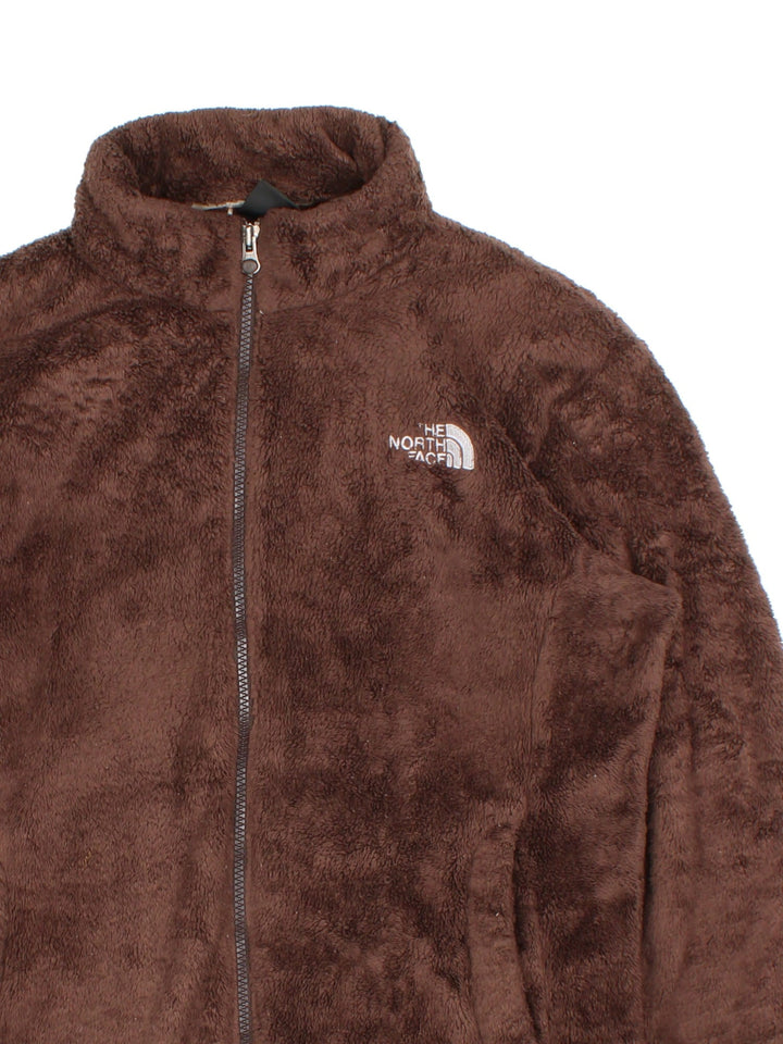 The North Face Osito Fleece in a brown colourway. Full zip with side pockets and small classic logo on the front.