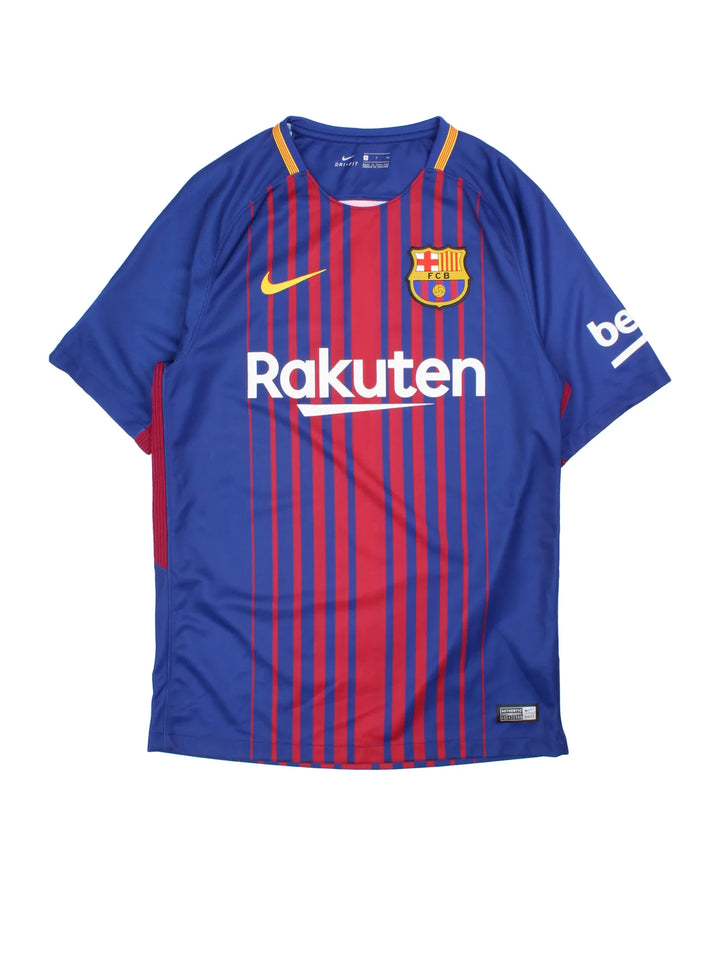 Barcelona 2017/18 Nike Football Shirt in the Red & blue home kit colourway, features printed logos and badge on the front and la liga badge on the sleeve.