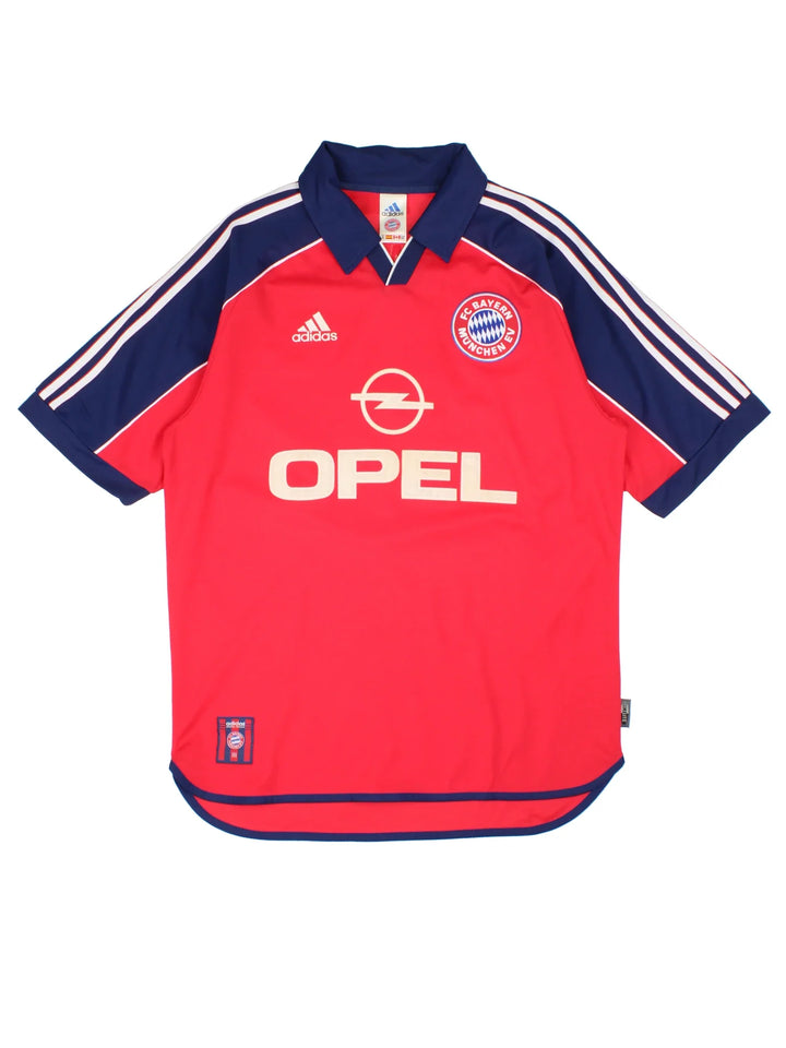1999/01 Bayern Munich Adidas Football Shirt in the red home kit colourway, features embroidered logos and badge on the front, classic three stripe along the sleeve and large sponsor on the front.