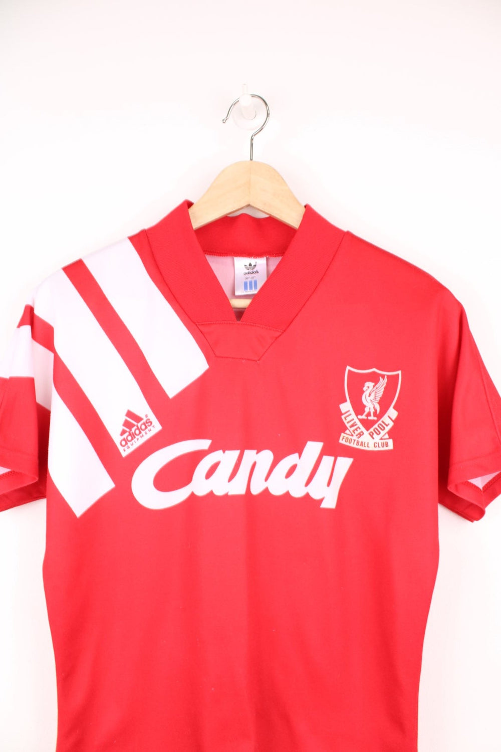 Liverpool 1991/92 Adidas Home Football Kit in the red and white team colourway, v neck and has the logos printed on the front. 