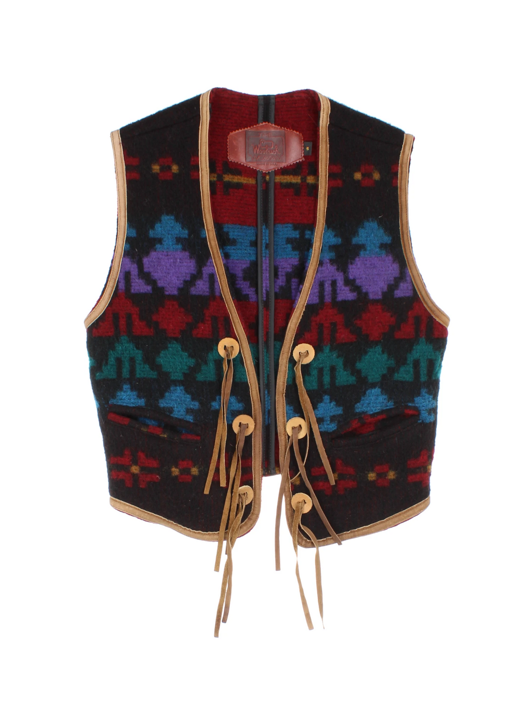 Woolrich patterned vest with geometric designs in red, blue and purple, tie-up closure with brown suede ribbons, and two pockets. 
