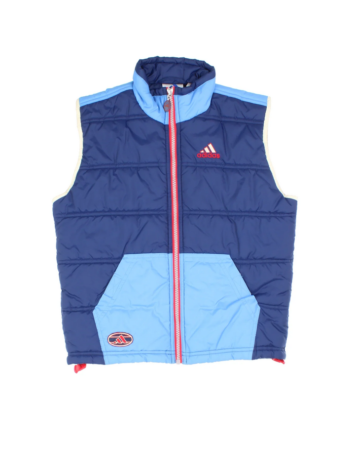 Adidas Puffer Gilet in a blue colourway. Zips up, with side pockets, contrast piping and branding embroidered on front.