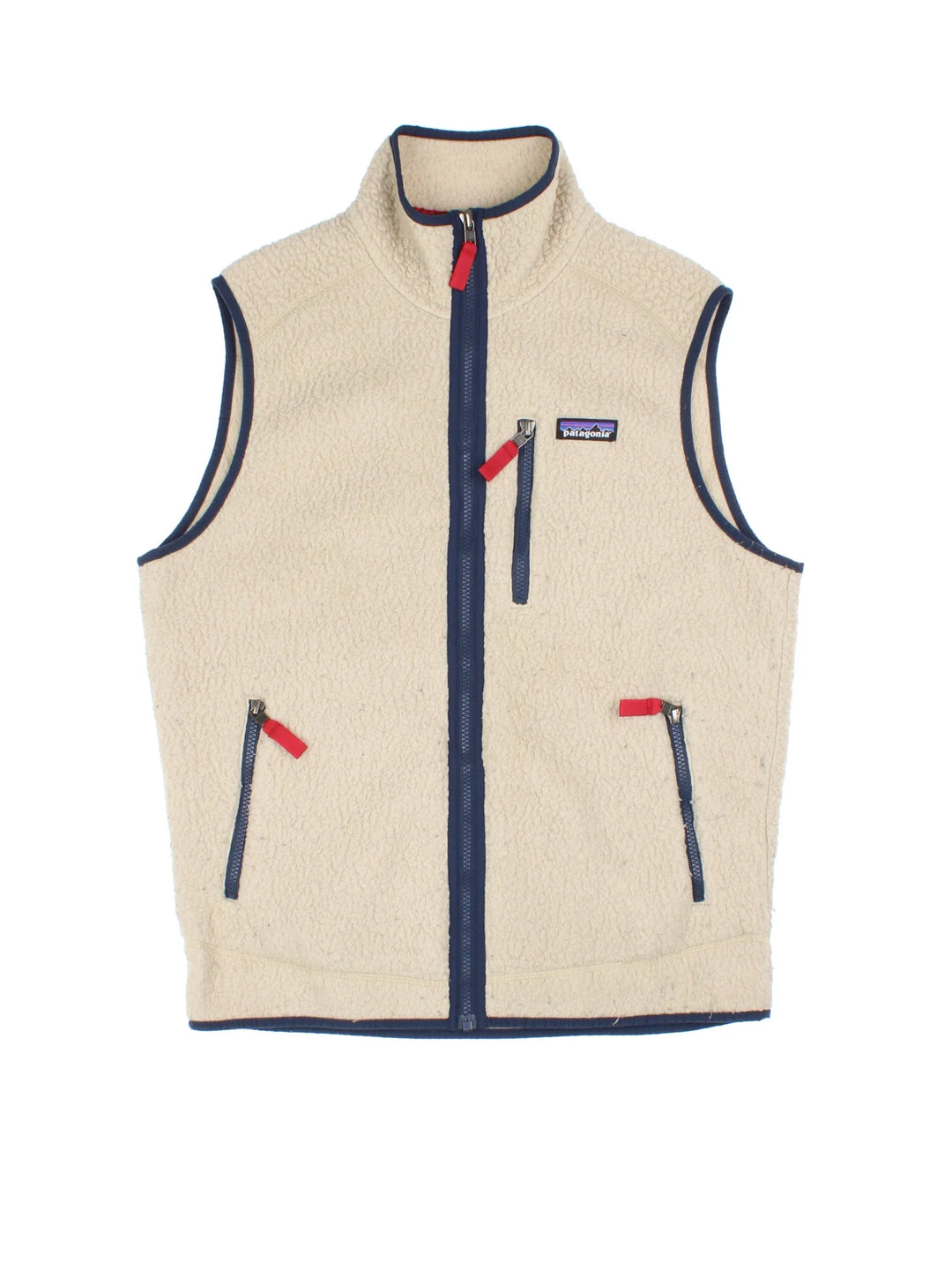 Patagonia Fleece Vest in a tan colourway. Zips up, with multiple pockets, contrast piping and branding embroidered on the front.