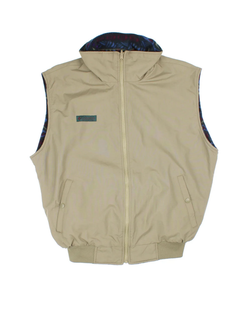 Columbia Reversible Gilet in either a multicoloured patterned fleece or tan canvas colourway options. Zips up, with side pockets and branding embroidered on the front.