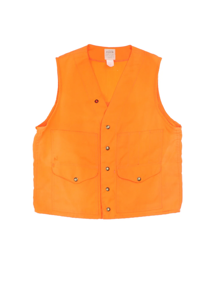 Vintage C.C. Filson Hunting Vest in a orange colourway. Buttons up with a v neck collar and has multiple pockets.