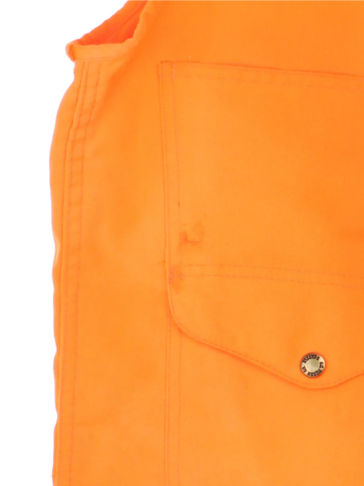 Vintage C.C. Filson Hunting Vest in a orange colourway. Buttons up with a v neck collar and has multiple pockets.