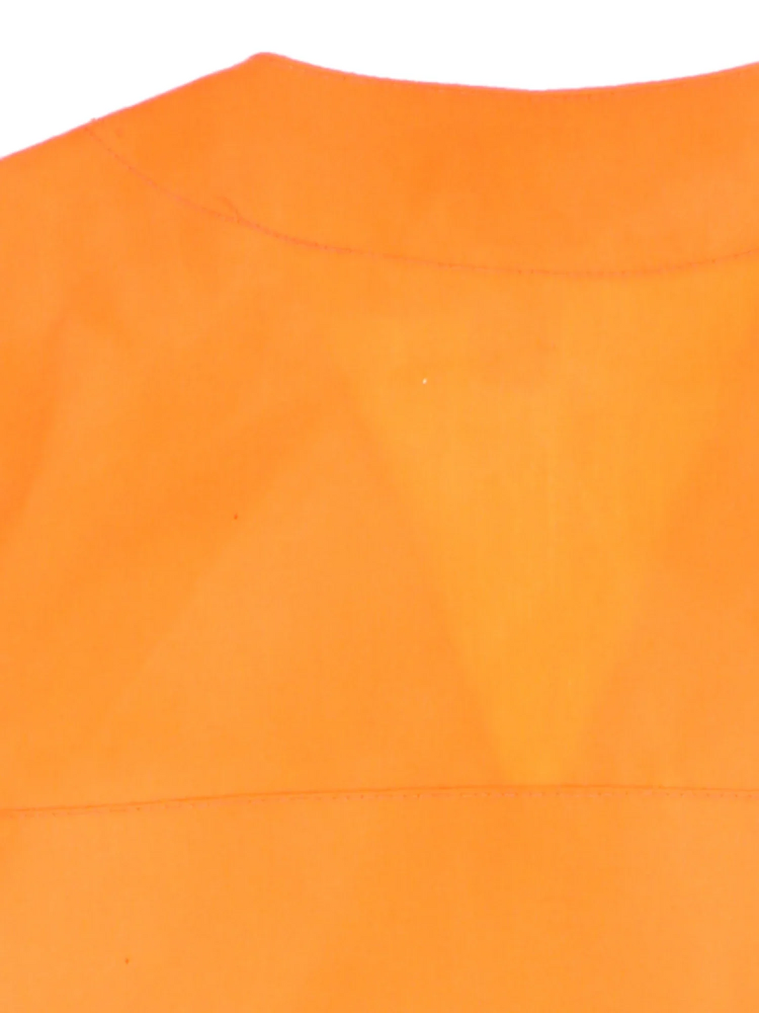 Vintage C.C. Filson Hunting Vest in a orange colourway. Buttons up with a v neck collar and has multiple pockets.