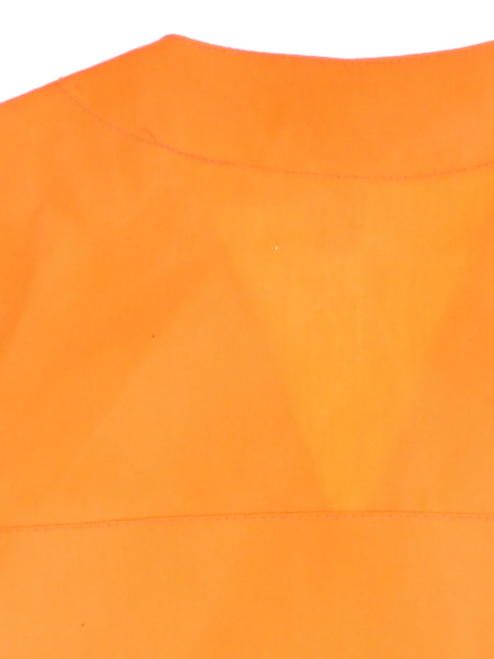 Vintage C.C. Filson Hunting Vest in a orange colourway. Buttons up with a v neck collar and has multiple pockets.