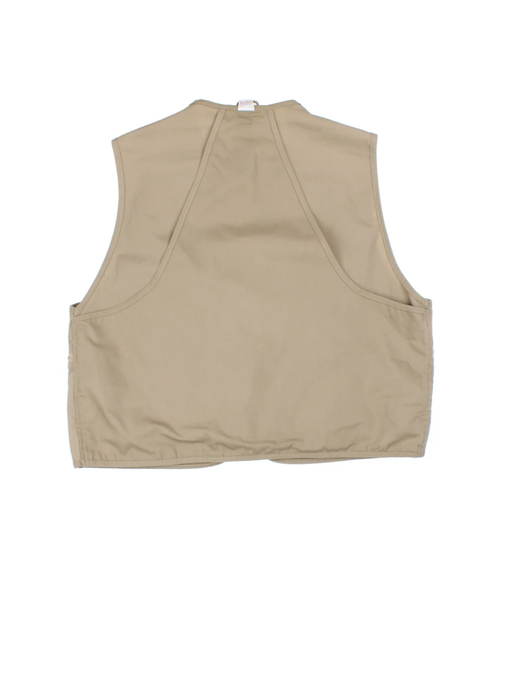 Vintage Columbia Fishing Vest in a tan colourway. Half zip up closure with multiple utility pockets, and has the logo embroidered on the front.